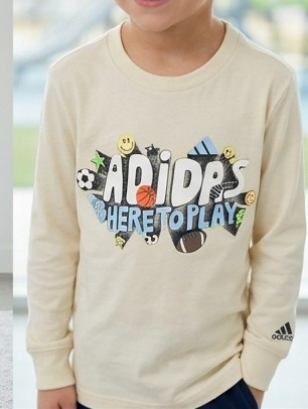 Adidas Cream Long Sleeve Tee with Playful Sports Graphic